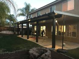 The roof panels create a flat finished ceiling. Solid Two Tone Aluminum Patio Insulated Top Backyard Remodel Aluminum Patio Covers Patio Gazebo