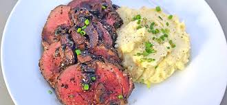 This elegant beef recipe is an ideal choice for entertaining. Peppered Beef Tenderloin With Red Wine And Portobello Mushroom Sauce Saber Barbecue Blog