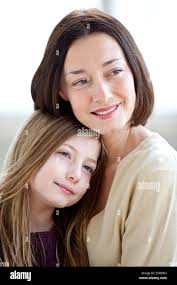 Mother and 13 year old daughter hi-res stock photography and images