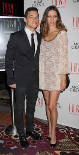 He is dating his girlfriend, lucy boynton; Rami Malek Height