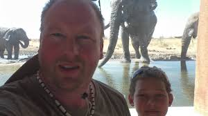 What time of day is best to see elephants at Olifantsbad watering hole?