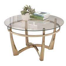 The first thing that will catch your attention is the stunning therefore, buying a good quality round glass coffee table will leave your guests talking about it. Acme Orlando Ii Round Glass Top Coffee Table In Champagne 81610