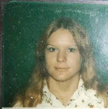 Sandra, pictured here in her senior photo, was 49 when she was murdered.
