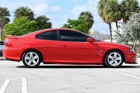 Image result for Red Brown 2004 Pontiac