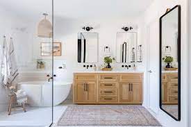 Photo credit | jamestown estate homes dark espresso color cabinets with the crema marfil tiles and bathroom countertop all around the long shape modern bathroom make the room even longer. 23 Gorgeous Bathroom Cabinet Ideas For Any Style