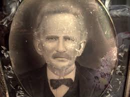 A picture of back in the old day's in WV. Can't really tell but the fellow  sitting look's like he is wearing a badge so he was probably the Sheriff or  Marshall