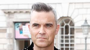 Robbie Williams in 'fear and panic' as he reveals father has Parkinson's  Disease