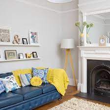 While only navy blue is traditionally considered a neutral, all shades of blue have sofa potential. Neutral Living Room With Blue Sofa Decorating Ideal Home Blue Sofas Living Room Blue And Yellow Living Room Living Room Grey