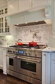 The operative word here is custom. Stove Sticks Out Like Lisa Designed Ours Overhead Exhaust Shelf Above Stove Cabinet Doors Appear To Be Cabi Kitchen Remodel Kitchen Design Home Kitchens