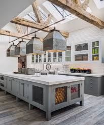 Large kitchen with marble island and skylights green large country kitchen with forest view. Spacious Kitchen With Exposed Joists And Beams Large Industrial Skylights And Pendants Over The Central Island In This Home In Los Angeles California 2783 3348 Roomporn