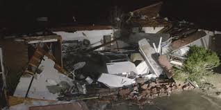 A safe room is all that's left of a farmstead after a tornado destroyed the surrounding house. Drone Footage Captures Devastation After Alabama Tornado
