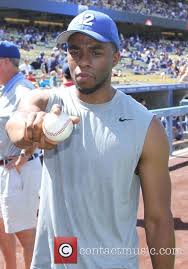 Jackie robinson's story, as told in 42, is incomplete and has some historical gaps, but it allows one father to begin a conversation with his son. Chadwick Boseman Actor Chadwick Boseman Who Played Jackie Robinson In The Movie 42 Throws Out The First Pitch At The Dodgers Game 1 Picture Contactmusic Com