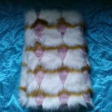 If you want a lightweight blanket, the chanasya fuzzy faux fur throw blanket is comfy, affordable, and available in a wide range of colors. Anthropologie Other Anthropologie Coren Faux Fur Throw Blanket Poshmark