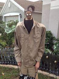 Man with bucket on his head passes the toilet paper to his wife sitting on the toilet, she too with bucket on her head. 24 Beetlejuice Ideas Beetlejuice Beetlejuice Halloween Halloween Fun