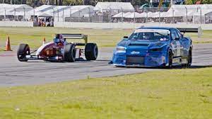THE SHOWDOWN! 1000hp R34 GTR vs F1 car - ROLL RACE! At the Adelaide  Motorsport Festival - YouTube