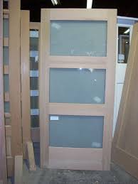 Battened and ledged doors can also be either braced or braced and framed to provide rigidity and better appearance. Three Panel Glass Interior Door Novocom Top