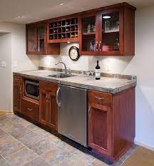 If you have a more formal living room, a finished basement can be a place where you and your loved ones gather to unwind, unplug, and unleash your inner couch potatoes. Attention Diy Network And Rate My Space Fans Finishing Basement Basement Remodeling Basement Kitchenette