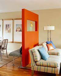 They purchased a plant stand from ikea, some metal buckets, and filled them with flowers. 27 Ways To Maximize Space With Room Dividers