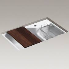 The sink is large, and not having a center divider really creates more space and function without taking up more space in the kitchen. Kohler Indio Undermount Cast Iron Kitchen Sink Inc Smart Divide 6411