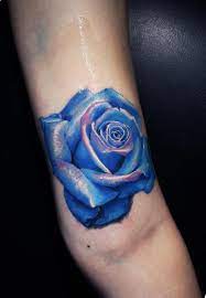 $40 tattoos and $20 piercings on wednesday! 18 Beautiful Blue Rose Flowers Tattoo Pictures