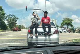 Watch Netizens See Red Over Two Little Daredevils On Moving Car New Straits Times Malaysia General Business Sports And Li Daredevil Straits Times Moving