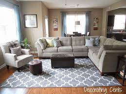 2 black and white armchairs match the rug offset with a beige sofa. Before After Projects Living Room Rug Placement Rugs In Living Room Living Room Grey