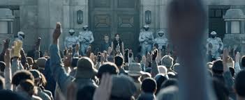 With jennifer lawrence, josh hutcherson, liam hemsworth, woody harrelson. The Hunger Games Catching Fire Teaser Trailer Salute Turn The Right Corner