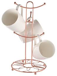 • made of metal with a blackened finish. Review For Buruis Mug Rack Tree Decorative Flower Pattern Base Metal Mug Holder Kitchen Coffee Mug Tree Countertop Tea Cups Holder Stand Coffee Cup Dryer With 6 Hooks Copper