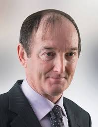 Pensioner was knocked down at pedestrian crossing