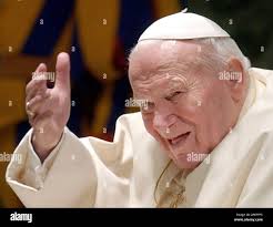Pope John Paul II smiles as he waves to faithful during his weekly general  audience in the Paul VI hall, at the Vatican, Wednesday, Jan. 12, 2005. The  Vatican said that Pope