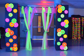 Smooth the tape with your hands to make sure it's adhered. Door Entrance Made Out Of Cardboard Boxes Black Paper And Fluorescent Paper Decor Uv Reactive Light Fabric Glow Birthday Party Glow In Dark Party Neon Party