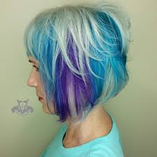 If you are going for a beige white blonde and not a total white, you can do so with the following formulas: Platinum White Blonde Teal And Purple Hair Color Inverted Bob Haircut Sarasota Bradenton Hair Salon