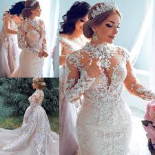Plus size mermaid wedding guest dresses for women with short sleeve $46.99 maxi long mermaid floral lace evening dress with short sleeve maxi long mermaid floral lace evening dress with short sleeve $50.99 elegant round neckline lace mermaid evening dress with long sleeve Arabic Dubai Plus Size Mermaid Wedding Dresses Lace Detachable Train High Neck Lace Appliuqe Long Sleeves Wedding Dress Bridal Gowns Wedding Dress For Cheap Wedding Dress Gown From Mask 016 129 13 Dhgate Com
