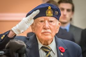 Remembrance Day service follows usual format, but Dr. Ritchie has passed  the torch
