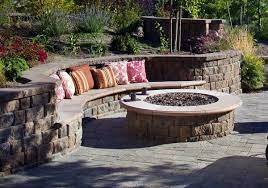 A well made retaining wall in your front or side yard can add curb appeal and safety to your home. Gabion Outdoor Fire Pit Stone Fire Pit Design Ideas Nz Fire Pit Backyard Backyard Fire Fire Pit Seating Area