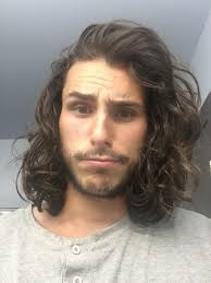 Start with a shampoo/conditioner combo that won't weigh your hair down, like a volumizing line. then, detangle when conditioner is in the hair, rinse, and blot dry gently. Long Wavy Hair Men Back Novocom Top