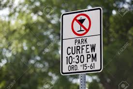 Curfew is a feature in the sims 3 and the sims 4: A Curfew Sign At A City Park Stock Photo Picture And Royalty Free Image Image 11620975
