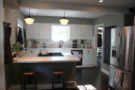 The secret is to use contrasting neutrals. Schoolhouse Pendants Transitional Kitchen The Fat Hydrangea