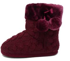 We managed to find this free pattern for our newest obsession: Dunlop Slipper Boots Knitted Upper With Pom Poms Burgundy