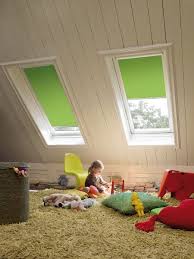 interieur coosje velux dakramen en bekleding rolgordijnen woonkamer jaloezieen patio zonwering