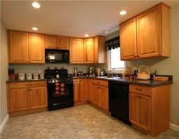 Kitchen Design Ideas With Oak Cabinets Vinyl Design Interiors Oak Kitchen Black Appliances Kitchen Oak Kitchen Cabinets