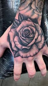 Traditional red and black rose tattoos on both hands. 150 Trendy Hand Tattoos For Men You Must See Tattoo Me Now