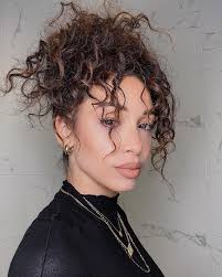 Next, add luxe, loose waves to the hair using the ghd gold® styler in pure gold.place the ghd gold® styler at the root and rotate half a turn to start creating some. Danielle Peazer