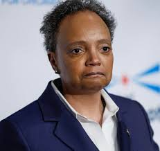 Ex-Mayor Lori Lightfoot says Trump is “MANUFACTURING" Chicago's crime  crisis and she won't just stand by while he sends troops in, especially  since it's his fault she lost her last election.