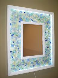 Mosaic Mirror Made From Sea Glass And Epoxy Resin Led Lighting Installed Around Mirror And Frame Item For Sale Mosaic Mosaic Mirror Mirror Mosaic I was attracted to the beachy look of the tile but this frame is even better!