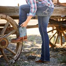 Ariat apparel real design boot cut leg opening medium wash hand sanding 9.75 oz denim 93% cotton, 5% poly, 2% spandex embroidered and stitched design on back pockets 10017510 the perfect riding jean, engineered in performance stretch denim for. R E A L Mid Rise Stretch Entwined Boot Cut Jean Ariat