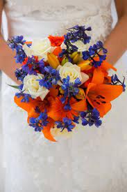 Check spelling or type a new query. My Bridal Bouquet Blue And Orange For Mets Colors Daisies Lilies Roses And Delphinium Orange Flower Bouquets Orange Wedding Flowers Blue Wedding Bouquet