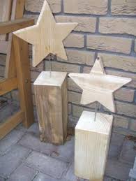 Holzsterne Auf Holzsockel Fur Den Garten Weihnachten Holz Holzsterne Weihnachtsdekoration