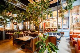 Forget Your Fiddle Leaf Figs 2020 Restaurant Decor Is All About The Booth Tree In 2020 Restaurant Decor Bistro Decor Restaurant Design
