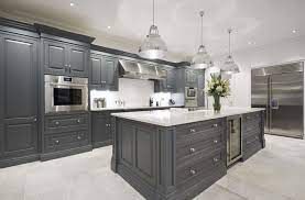 Grey kitchens are ideal for both classic and contemporary designs. Dark Grey Kitchen Tom Howley